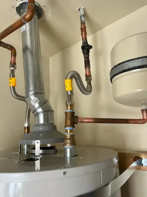 Water heater installation and plumbing repair in Brookside Woods